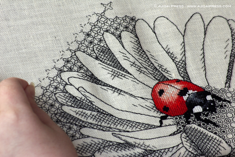 wip blackwork ladybug and daisy